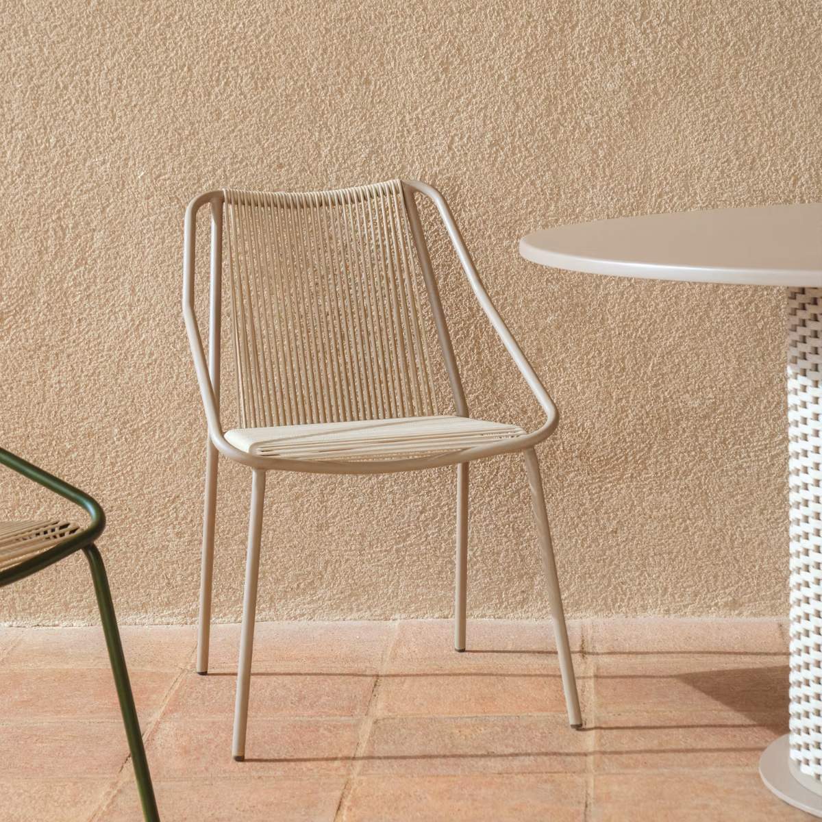 Kave Home Zivia stackable outdoor chair in ecru rope cord and burgundy galvanised steel