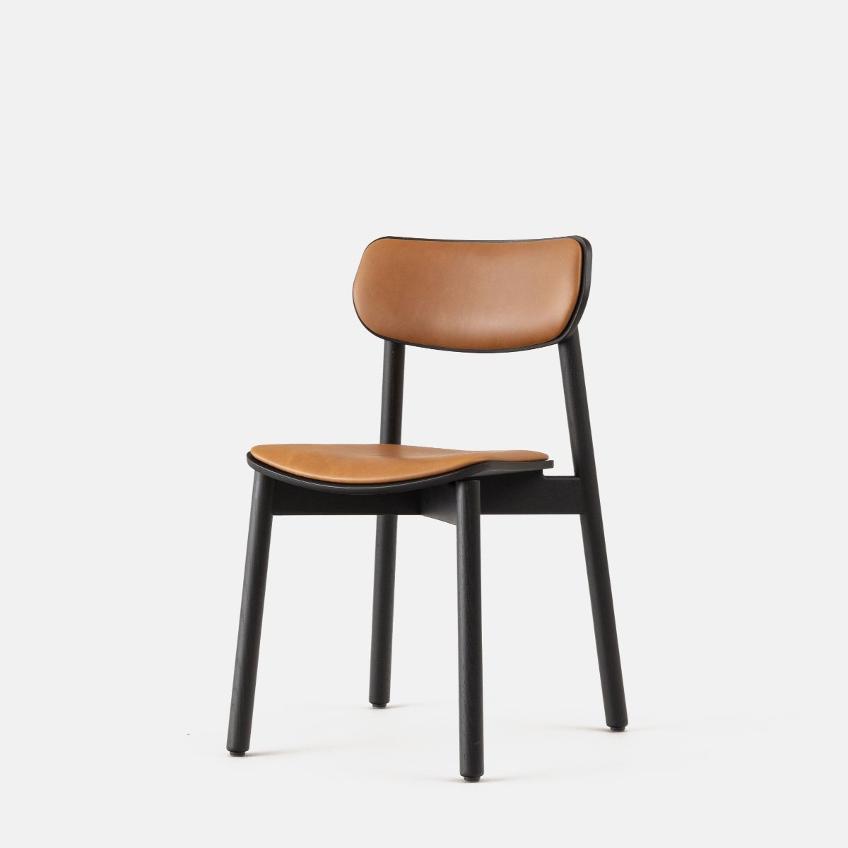 john green black otis chair upholstered  cognac leather seat and back