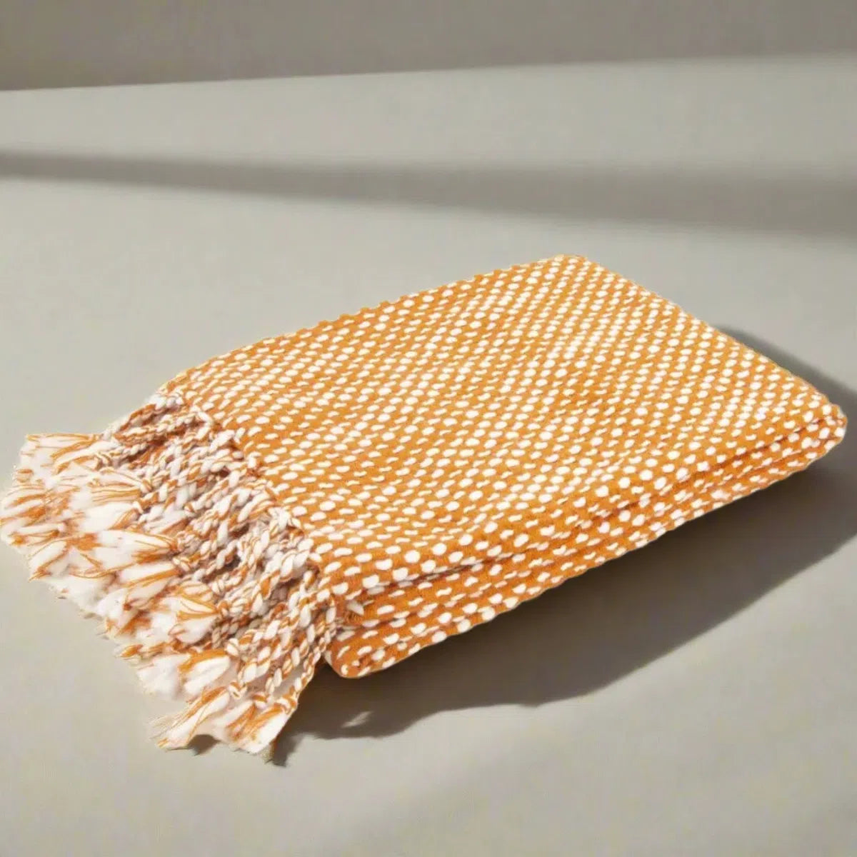 Malini Rust Raindrops Throw-Beaumonde